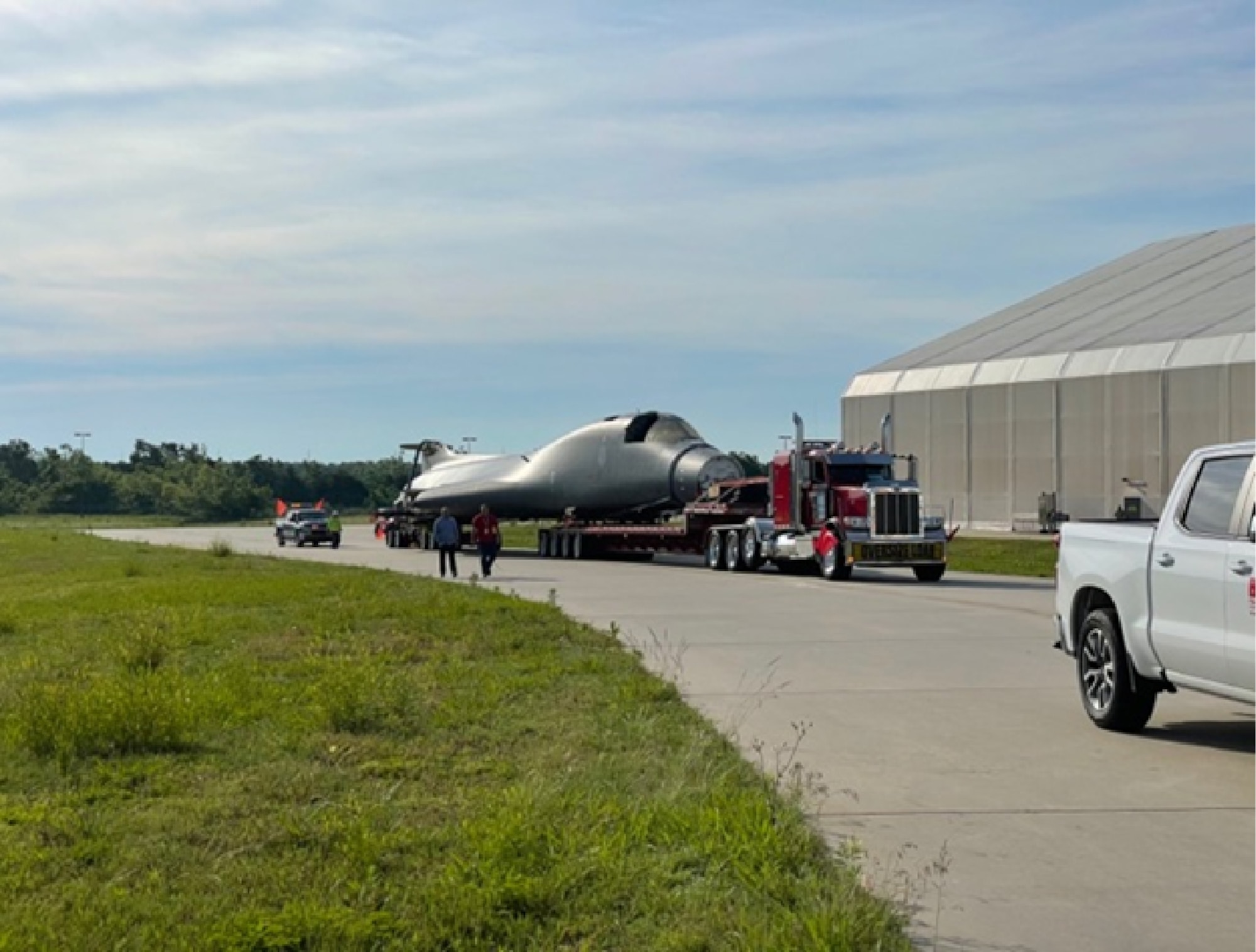 B-1 fuselage being towed by truck