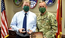 Garry Freeman, general engineer in the U.S. Army Space and Missile Defense Command Technical Center, receives the Director of Army Safety Risk Management Award from Lt. Gen. Daniel L. Karbler, USASMDC commanding general, during a ceremony at the command’s Redstone Arsenal headquarters, Sept. 27. (U.S. Army photo by Jason Cutshaw)