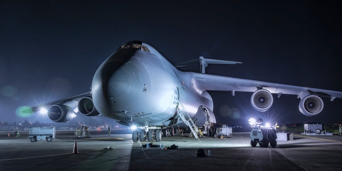 A C-5M Super Galaxy assigned to the 60th Air Mobility Wing, Travis Air Force Base, Calf. sits on the flightline