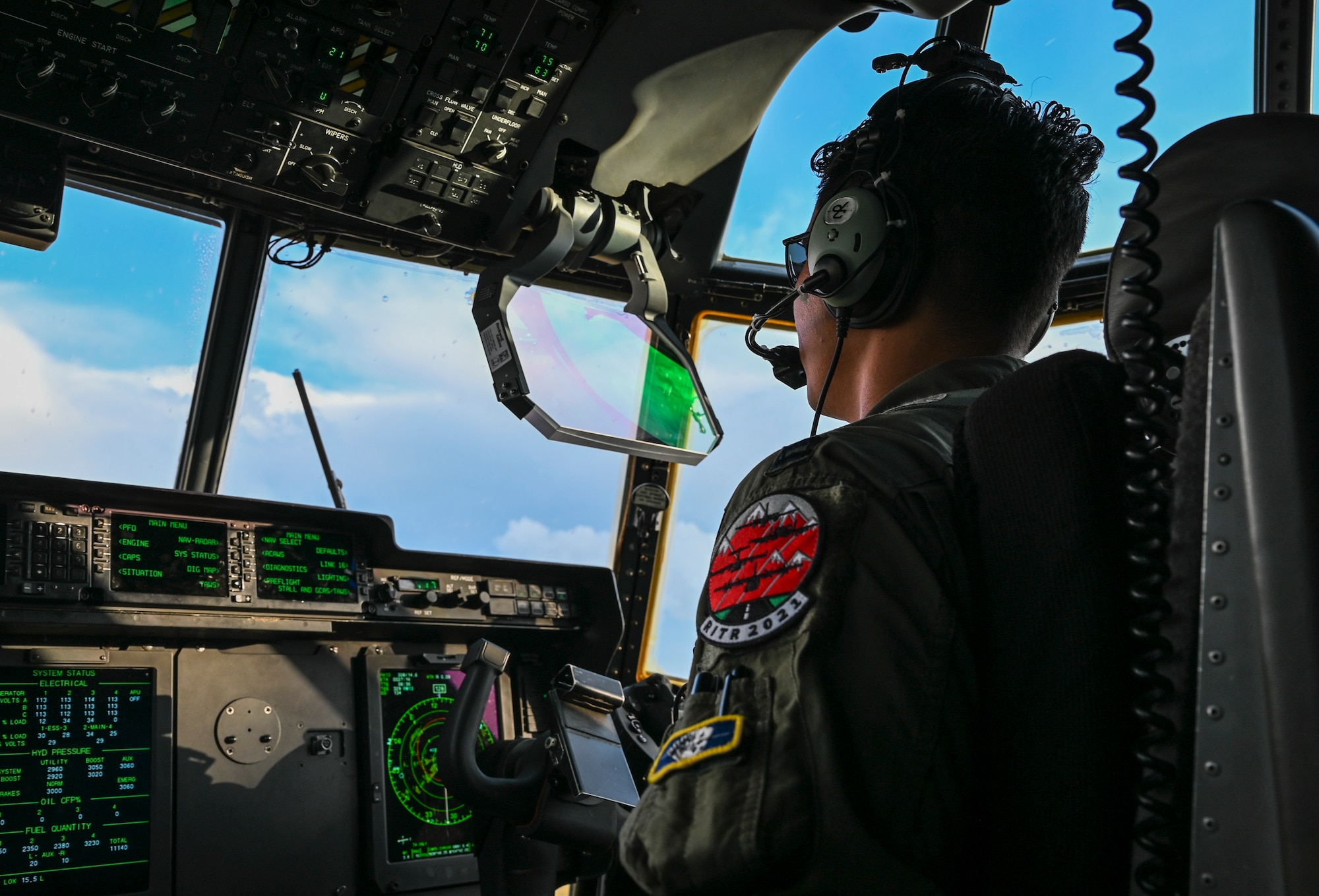 A photo of a pilot flying a plane