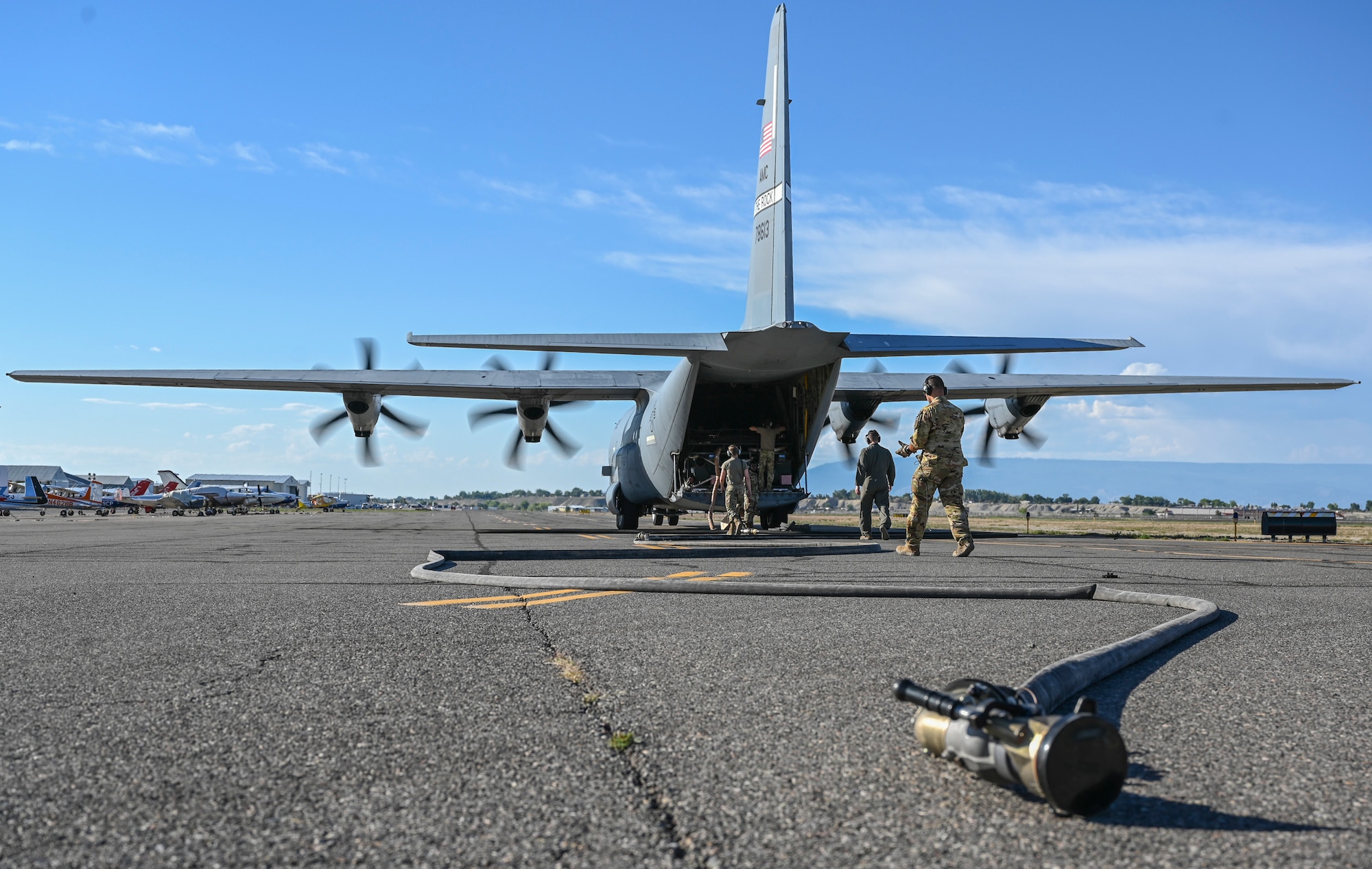 A photo of a plane on the flight line