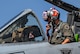 A photo of a pilot in an plane