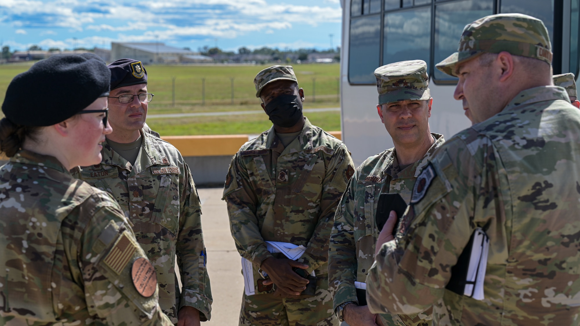 Col. Mark Dmytryszyn, 2nd Bomb Wing commander, converses with Maj. Gen. Andrew Gebara, 8th Air Force and Joint-Global Strike Operations Center commander, and leaders of the 2nd Security Forces Squadron at Barksdale Air Force Base, Louisiana,  Sept. 28, 2021. Gebara visited multiple units during his visit, immersing himself into Barksdale’s Stiker Nation. (U.S. Air Force photo by Airman 1st Class Jonathan E. Ramos)