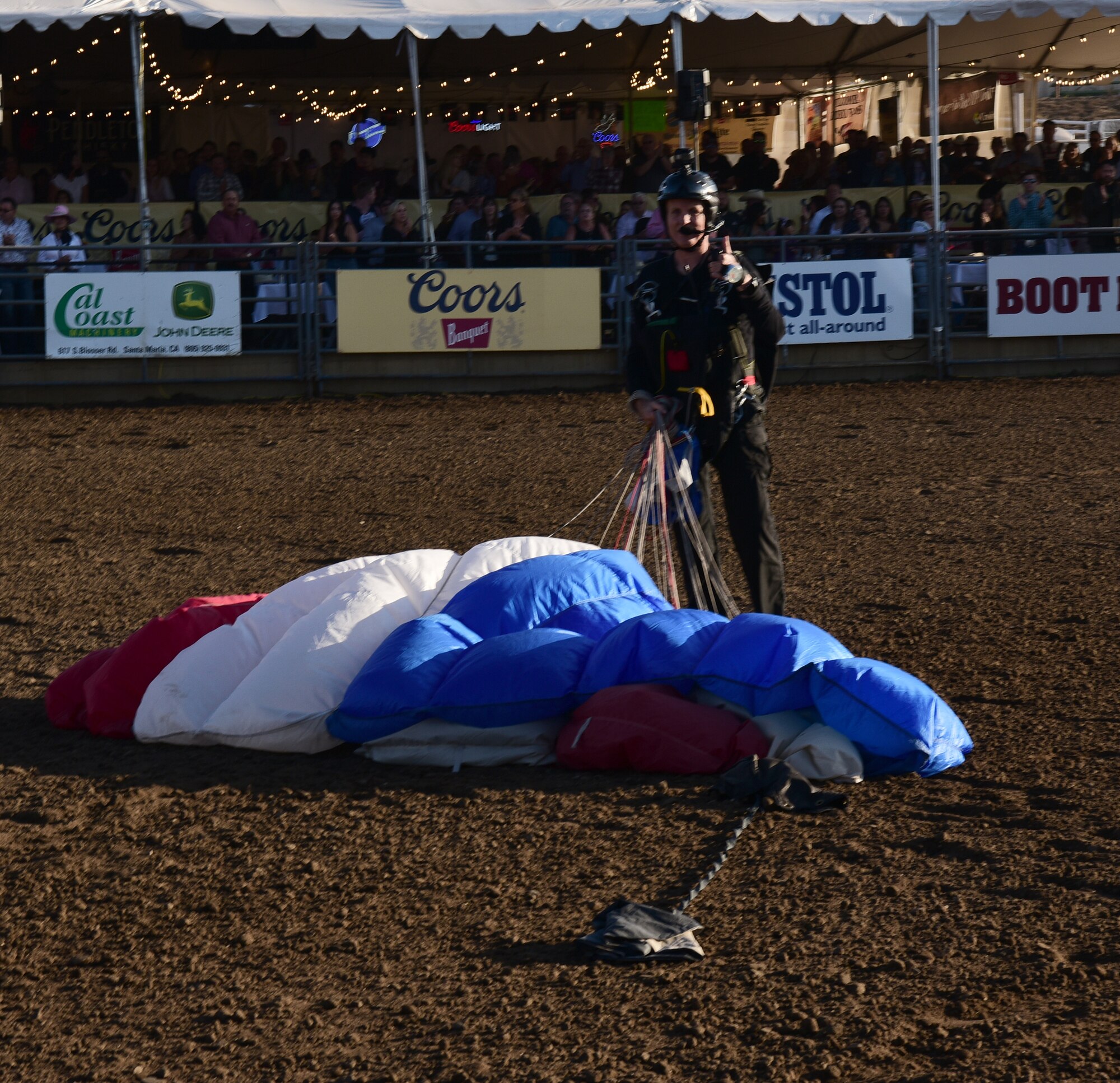 Skydiver, Kent Lane, speaks to the crowds in the stands at the Santa Maria Elks Rodeo in Santa Maria, California, Sept. 4, 2021. (U.S. Space Force photo by Airman First Class Tiarra Sibley)