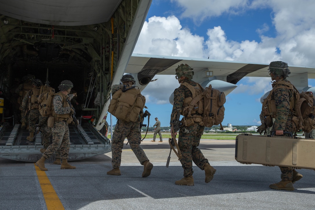 U.S. Marines with 2d Battalion, 3d Marines, 3d Marine Division board a KC-130J Super Hercules with 1st Marine Aircraft Wing while conducting a rapid response drill within the first island chain, Sept. 4, 2021. III Marine Expeditionary Force executed these actions as part of a series of integrated no-notice drills to maintain their high state of readiness and demonstrate U.S. resolve to maintain regional security. The drill refined command and control, communication and coordination of joint fires. 2/3 is forward-deployed under 4th Marines as a part of the Unit Deployment Program. (U.S. Marine Corps photo by Lance Cpl. Scott Aubuchon)