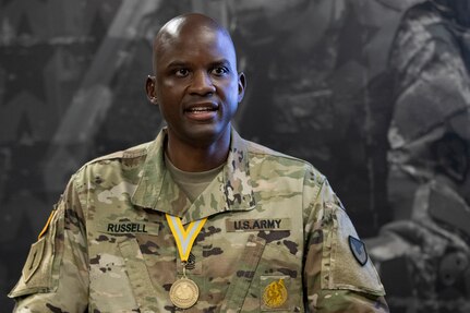 Sgt. Maj. Damien Russell, U.S. Army Financial Management Command Operations senior enlisted advisor, delivers a speech after being presented with the 837th Maj. Gen. Nathan Towson Medallion during a special ceremony at the Maj. Gen. Emmett J. Bean Federal Center in Indianapolis Aug. 26. The Towson Medallion was established by the Army Finance Corps Association on May 7, 1993, and is awarded in recognition of demonstrated exemplary contribution and service to the Army Finance Corps. (U.S. Army photo by Mark R. W. Orders-Woempner)