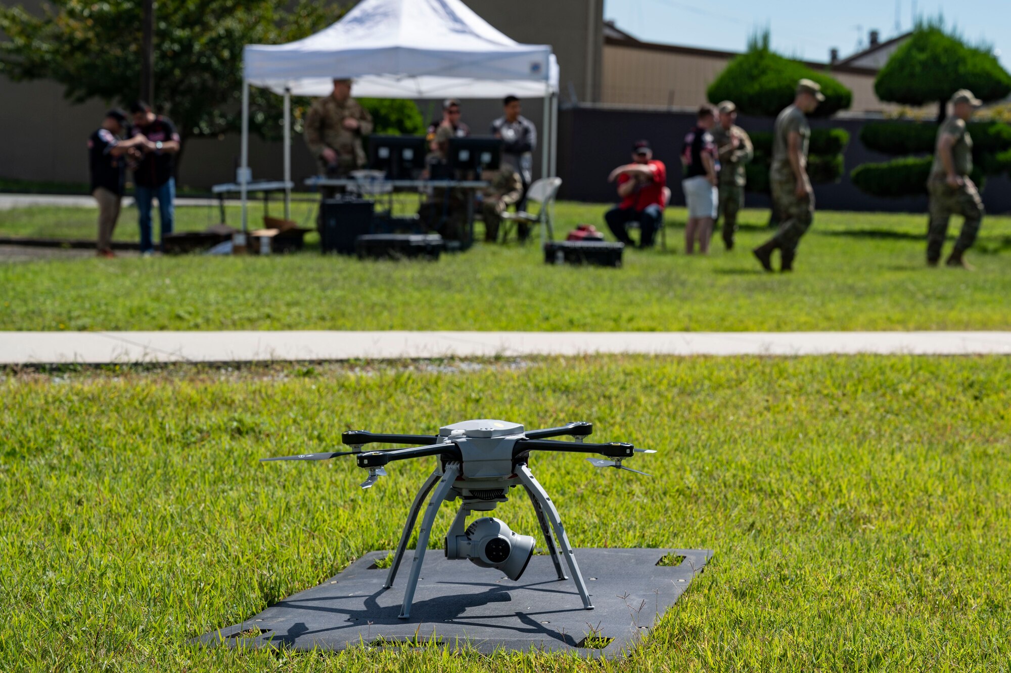 8th CES flies Small Unmanned Aircraft System to inspect dorm rooftops.