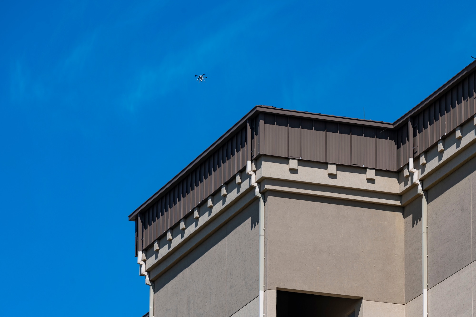 8th CES flies Small Unmanned Aircraft System to inspect dorm rooftops.