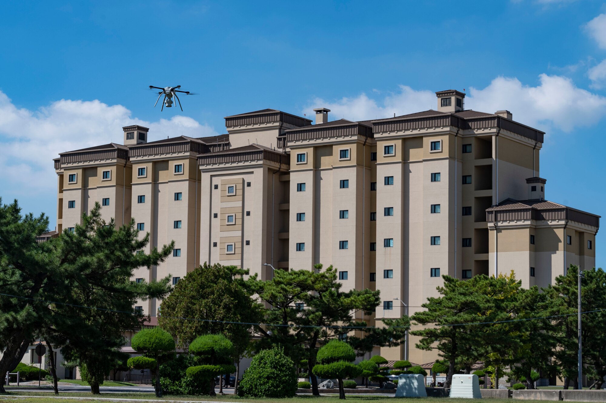 8th CES flies Small Unmanned Aircraft System to inspect dorm rooftops.