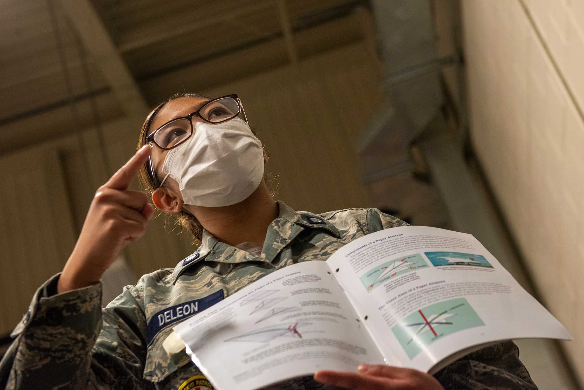 A member of Civil Air Patrol Unit 2801’s cadet training squadron, displays an example of the education materials the cadets study