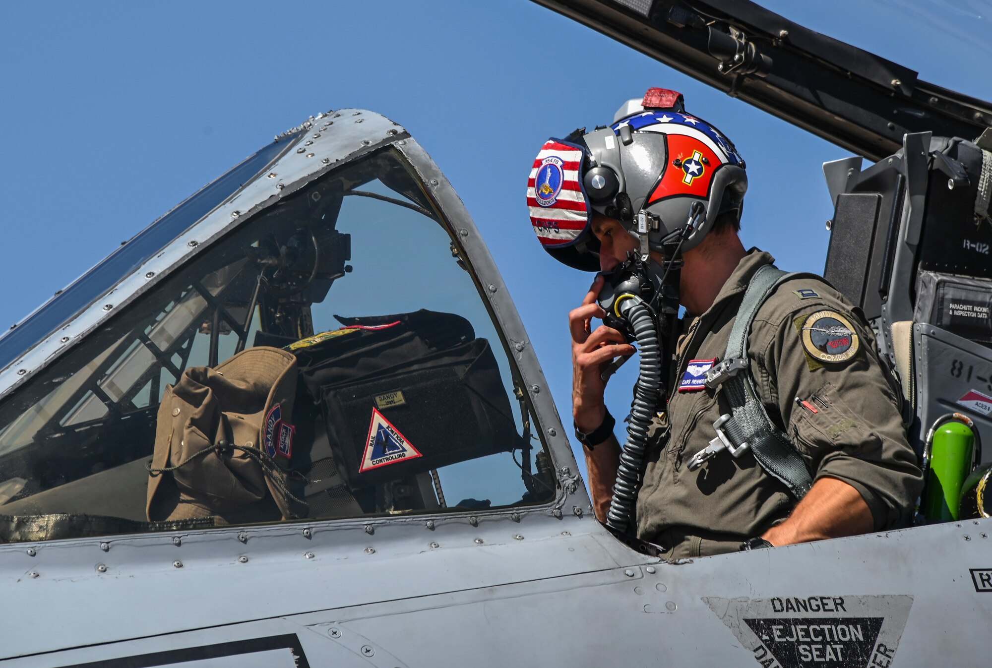 A photo of a pilot in an plane