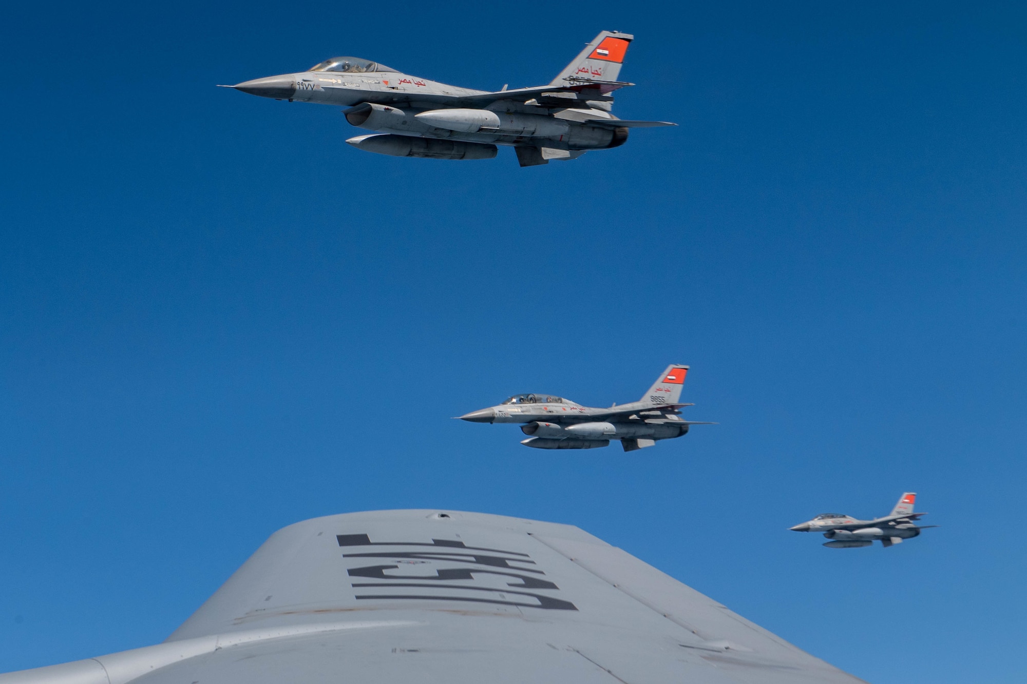 Three Egyptian air force F-16 Fighting Falcons fly in formation during Bright Star 21, over northern Egypt