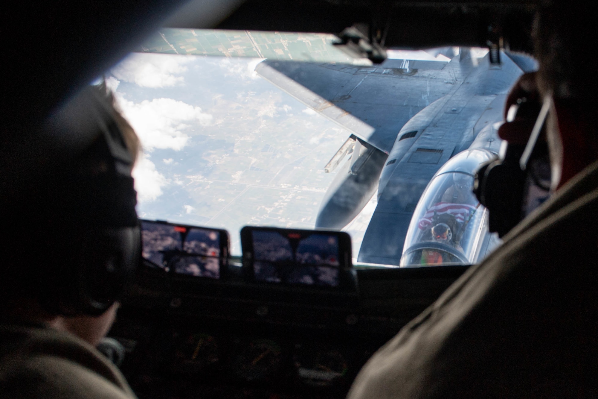 A U.S. Air Force F-15E Strike Eagle assigned to the 494th Expeditionary Fighter Squadron receives fuel from a KC-135 Stratotanker assigned to the 93rd Expeditionary Air Refueling Squadron in support of Bright Star 21