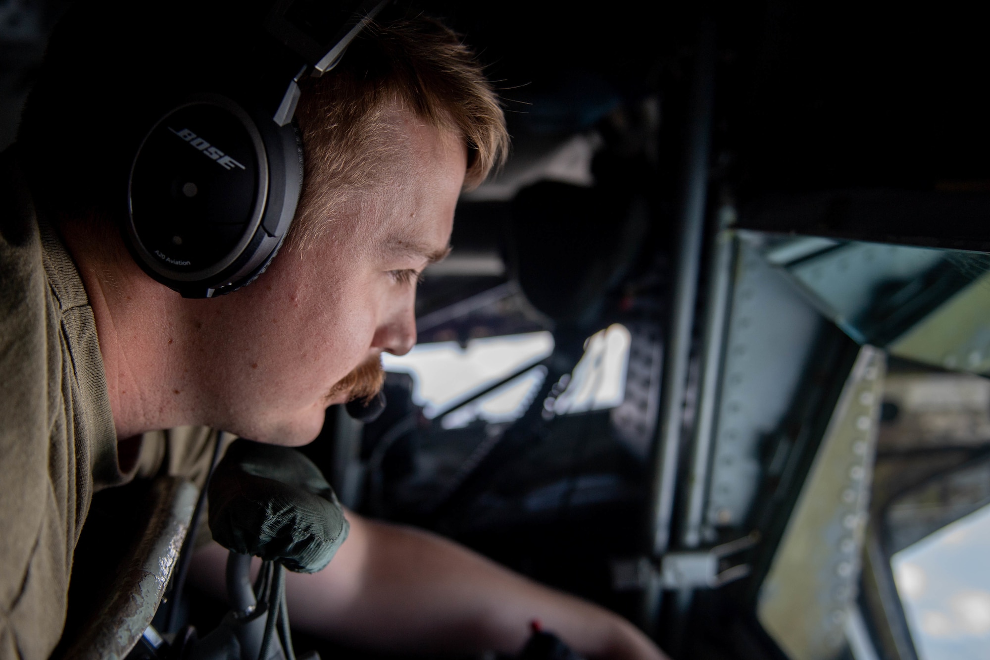 Airman 1st Class Bradley Behs, a KC-135 Stratotanker boom operator assigned to the 93rd Expedition Air Refueling Squadron, delivers fuel during Bright Star 21,