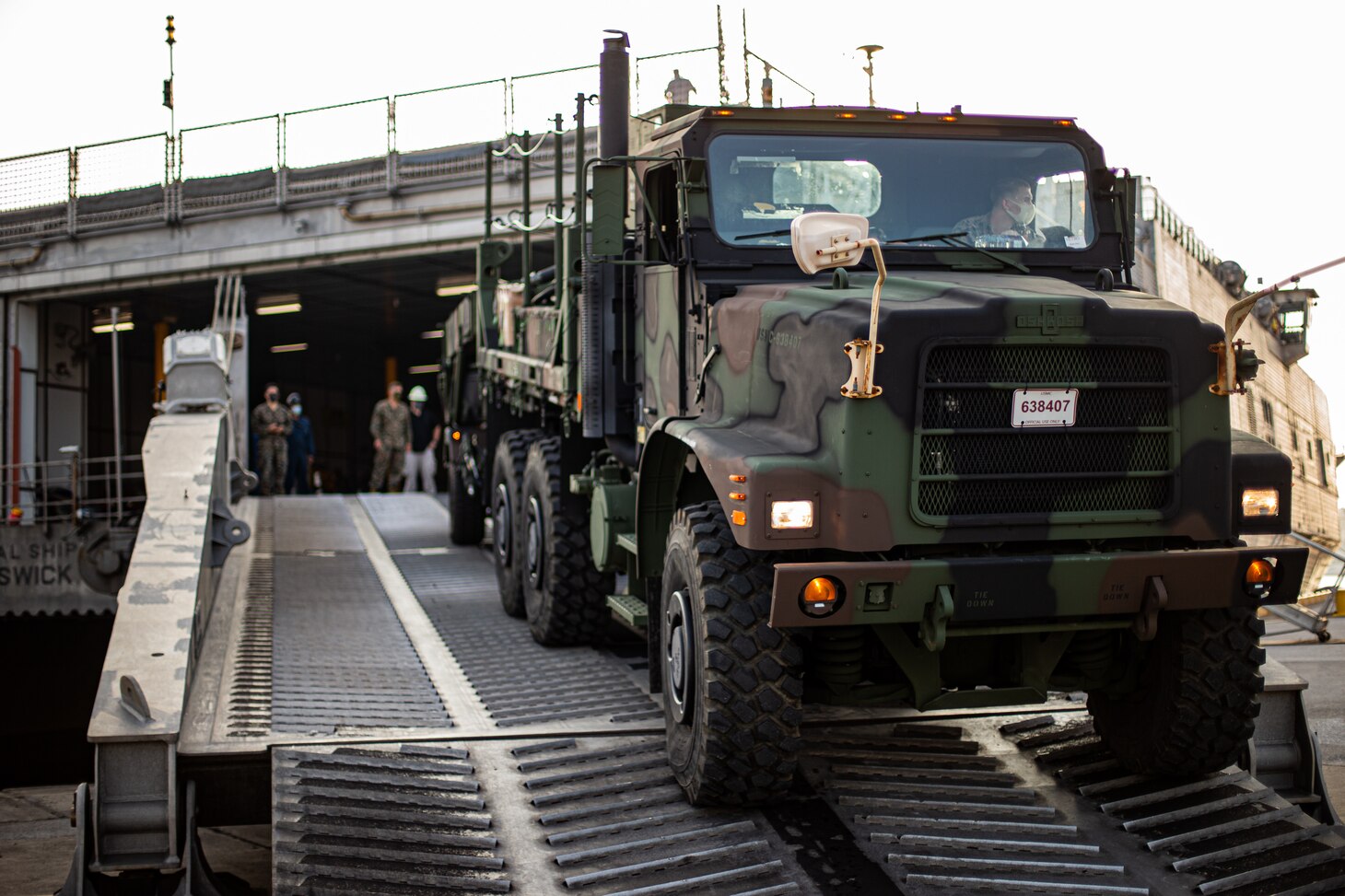 U.S. Marines with 3d Battalion, 12th Marines load a medium tactical vehicle replacement onto the Spearhead-class expeditionary fast transport USNS Brunswick (T-EPF 6) during Exercise Noble Jaguar 2021 at Naha Port, Okinawa, Japan