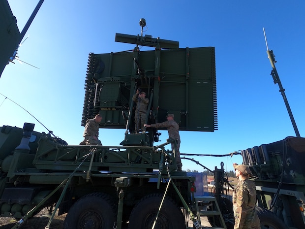 photo of U.S Airmen working on TPS-75 radar