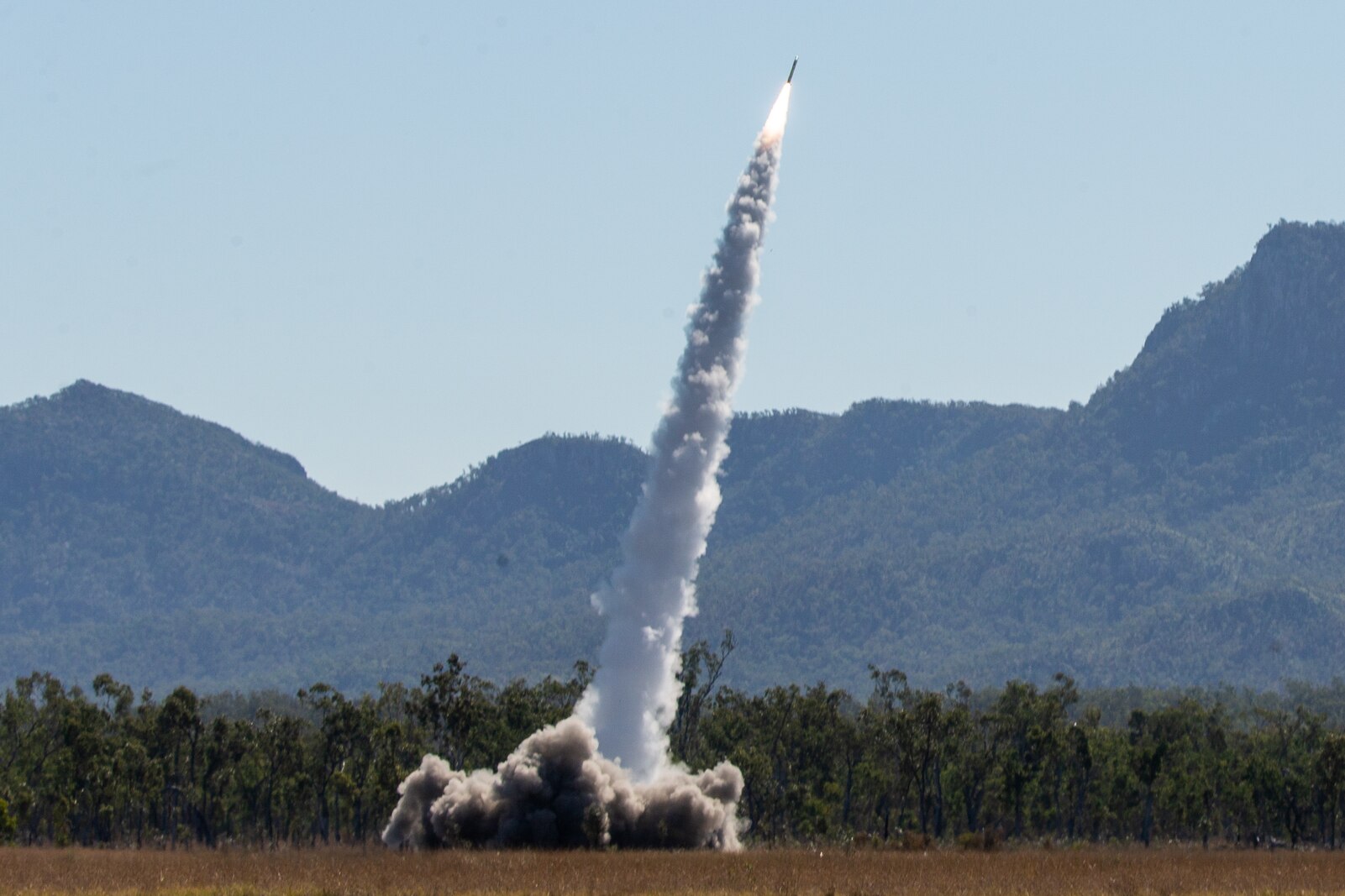 U.S. Marines with 3d Battalion, 12th Marines, 3d Marine Division, fire GMLRS rockets from a High Mobility Artillery Rocket System during Exercise Talisman Sabre 21 on Shoalwater Bay Training Area, Queensland, Australia, July 19, 2021. TS21 supports the U.S. National Defense Strategy by enhancing the ability to protect the homeland and provide combat-credible forces to address the full range of potential security concerns in the Indo-Pacific (U.S. Marine Corps photo by Lance Cpl. Ujian Gosun)