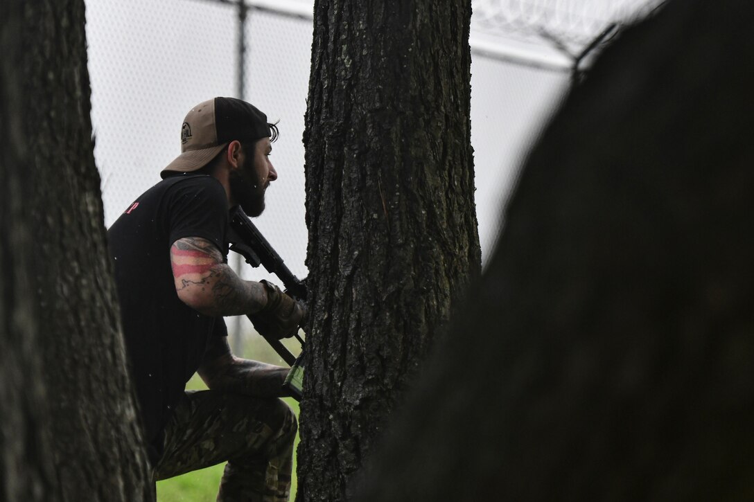 An Airman takes cover.