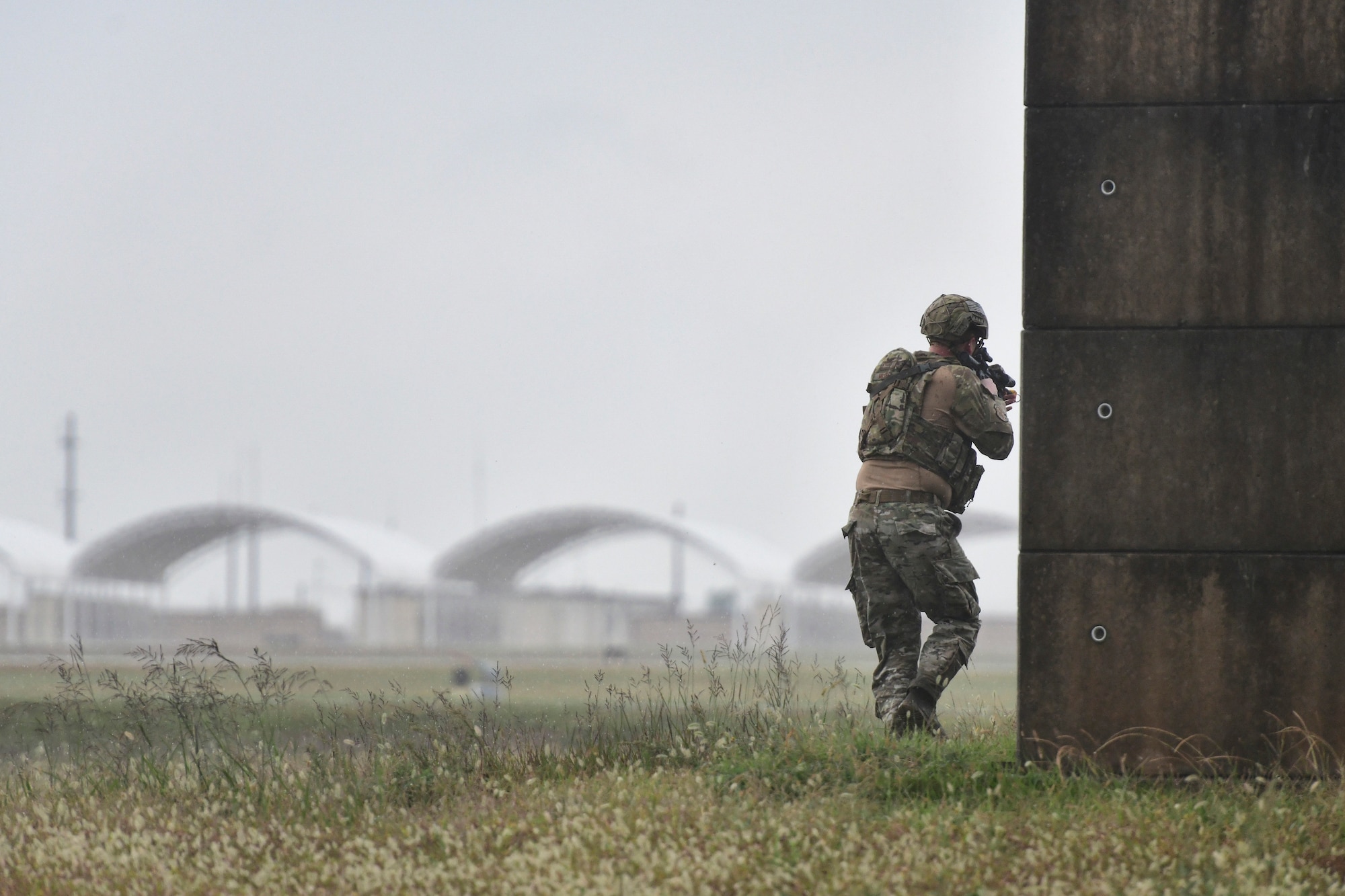 An Airman moves forward during training.