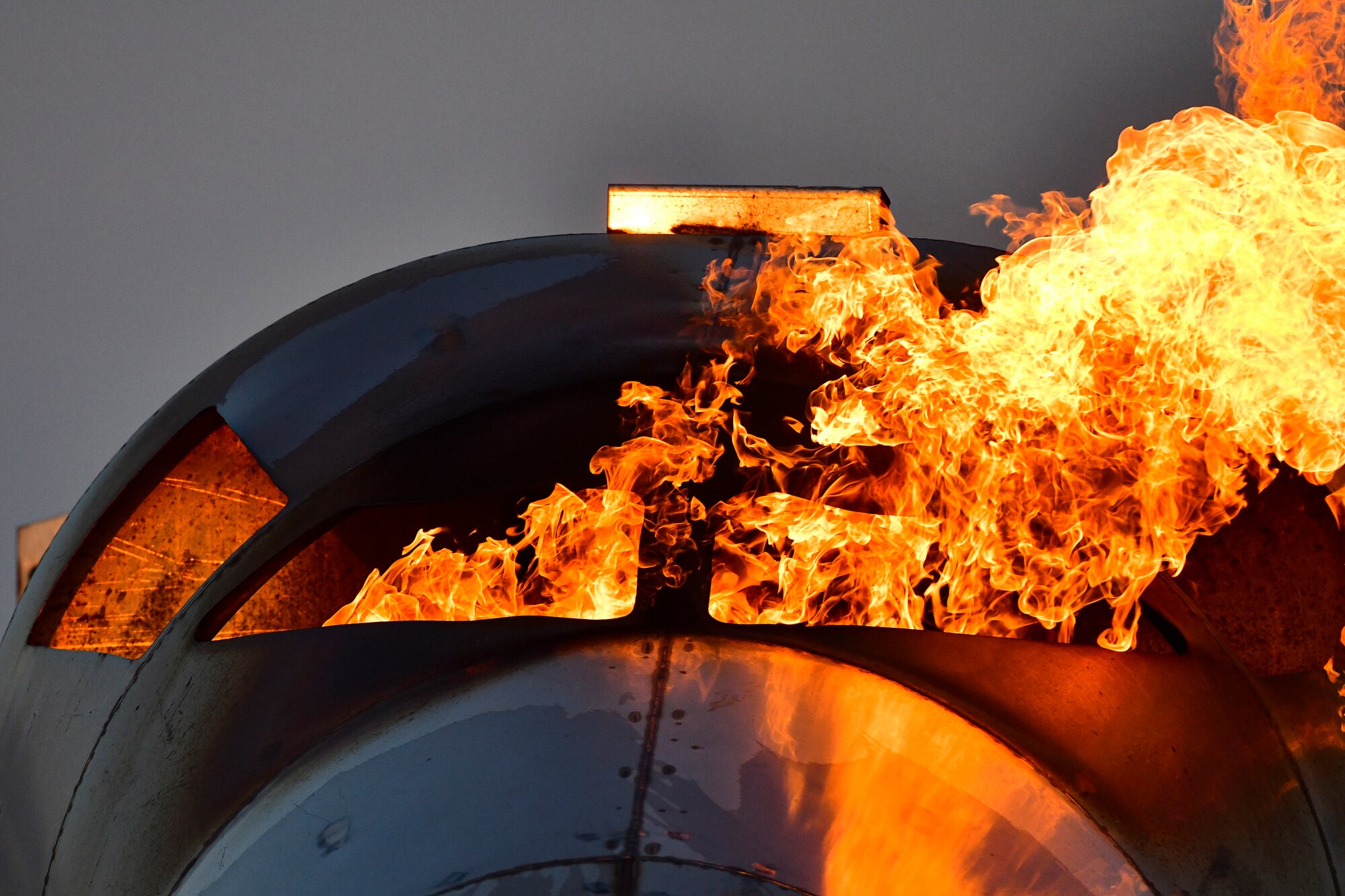 Airmen set a simulated aircraft on fire.