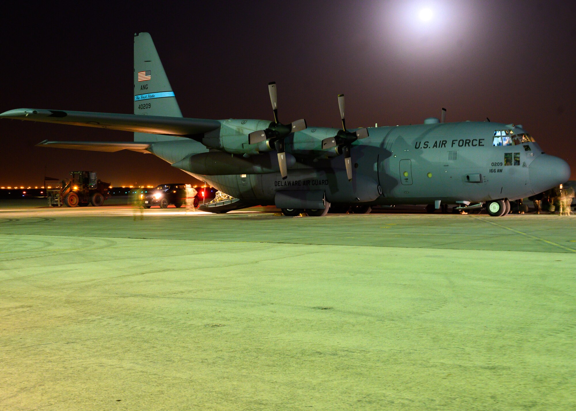 U.S. Air Force personnel load into a C-130 Hercules on the flightline at Prince Sultan Air Base, Kingdom of Saudi Arabia, prior to takeoff for Al Udeid Air Base, Qatar, Aug. 21, 2021. The 378th Air Expeditionary Wing provided air support, logistics, manpower and resources to U.S. Air Forces Central in support of the evacuation of American citizens, special immigrant visa applicants and other at-risk individuals from Afghanistan. (U.S. Air Force photo by Senior Airman Samuel Earick)