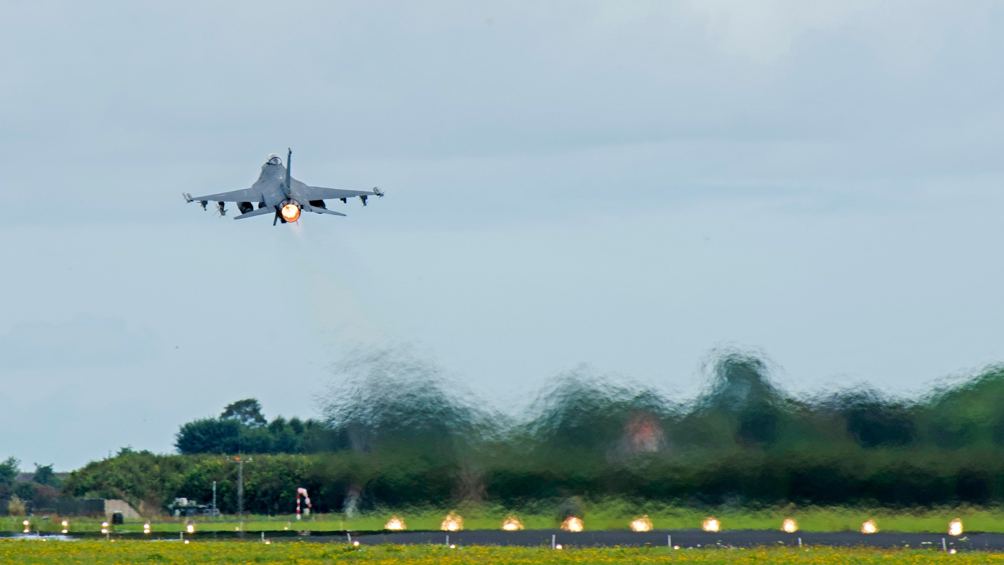 A U.S. Air Force F-16 Fighting Falcon assigned to the 480th Fighter Squadron, 52nd Fighter Wing, Spangdahlem Air Base, Germany, takes off at Leeuwarden Air Base, Netherlands, Sept. 13, 2021. The 480th FS integrated with coalition F-16 and F-35 Lightning II aircraft during the Suppression of Enemy Air Defense phase of a weapons instructor course that included pilots from Belgium, the Netherlands and Norway. (U.S. Air Force photo by Tech. Sgt. Anthony Plyler)
