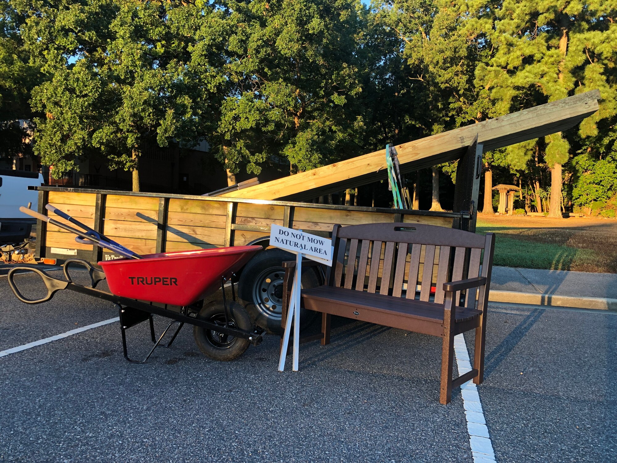 Equipment and recreational resources are prepared near Fort Eustis Nature Trail on Joint Base Langley-Eustis, Virginia, Sept. 25, 2021. On National Public Lands Day, 48 volunteers worked together to create pollinator habitats, plant native vegetation and set up learning opportunities for people to enjoy. (Courtesy photo)