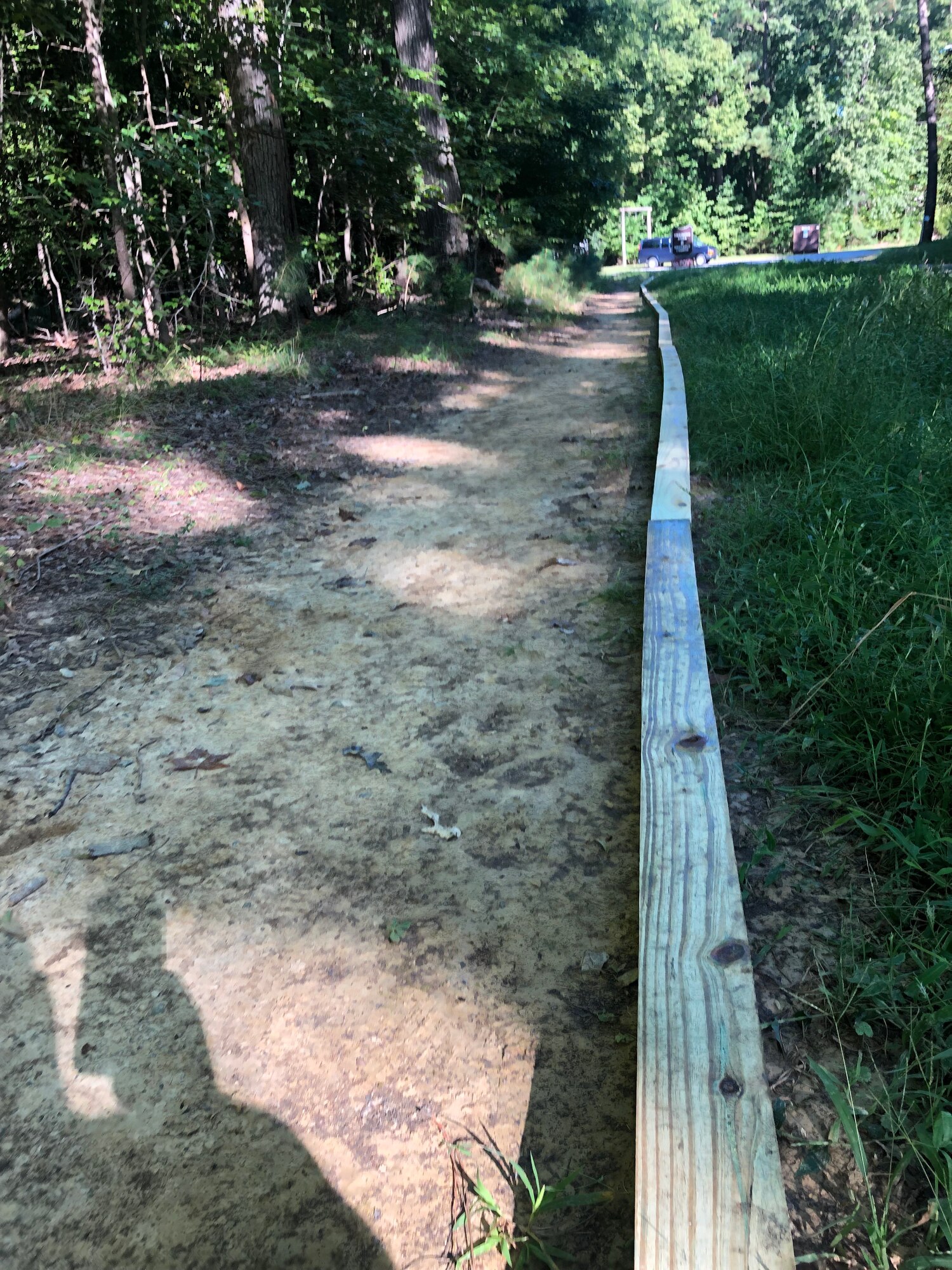 Volunteers prepare to work on parts of the  Fort Eustis Nature Trail on Joint Base Langley-Eustis, Virginia, Sept. 25, 2021. On National Public Lands Day, volunteers worked together to add rest areas and fix parts of the trail that become muddy during rainy weather. (Courtesy photo)