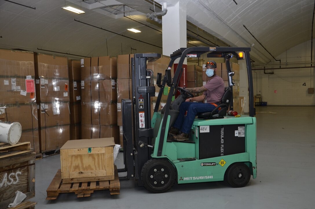 Man drives a forklift