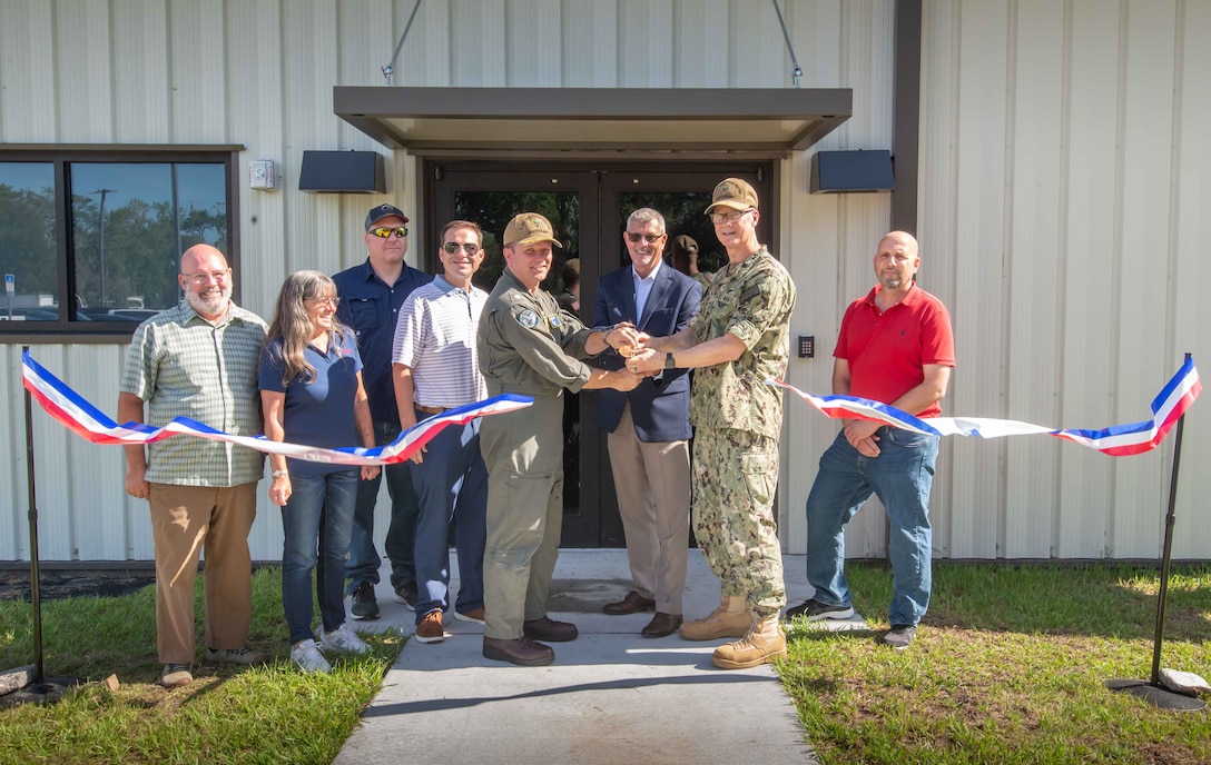 210720-N-DG108-1039
JACKSONVILLE, Fla. (July 20, 2021) Fleet Readiness Center Southeast (FRCSE) leadership inducted its newest facility, Building 226, into the Capt. Christopher J. Roum Engineering and Logistics Complex aboard Naval Air Station Jacksonville, at a ribbon-cutting ceremony on July 20, 2021. The new building will be used by engineering and logistics teams to support advancing aircraft platforms.