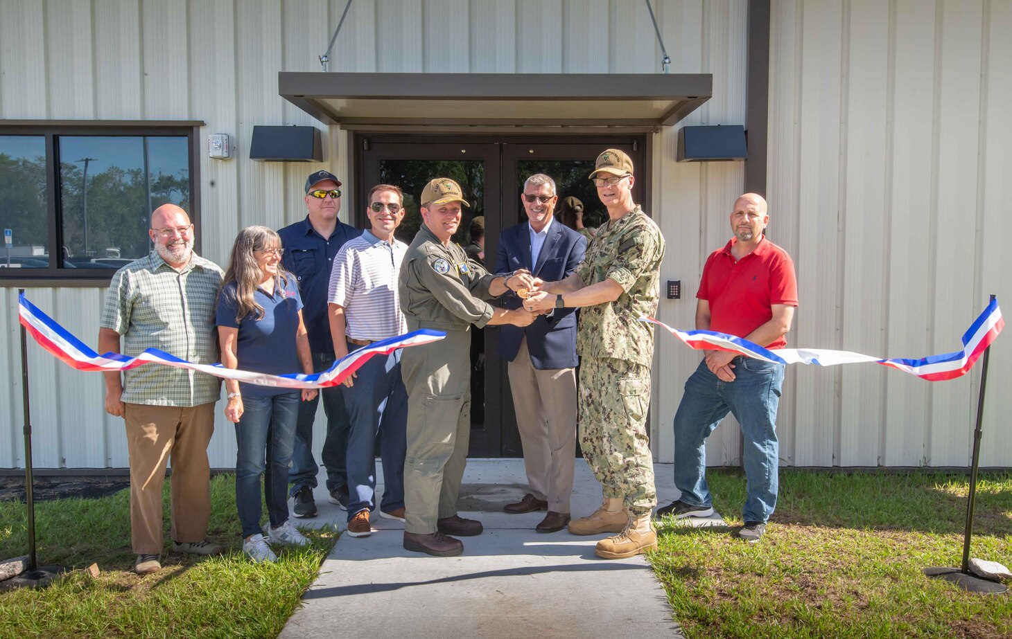 210720-N-DG108-1039
JACKSONVILLE, Fla. (July 20, 2021) Fleet Readiness Center Southeast (FRCSE) leadership inducted its newest facility, Building 226, into the Capt. Christopher J. Roum Engineering and Logistics Complex aboard Naval Air Station Jacksonville, at a ribbon-cutting ceremony on July 20, 2021. The new building will be used by engineering and logistics teams to support advancing aircraft platforms.