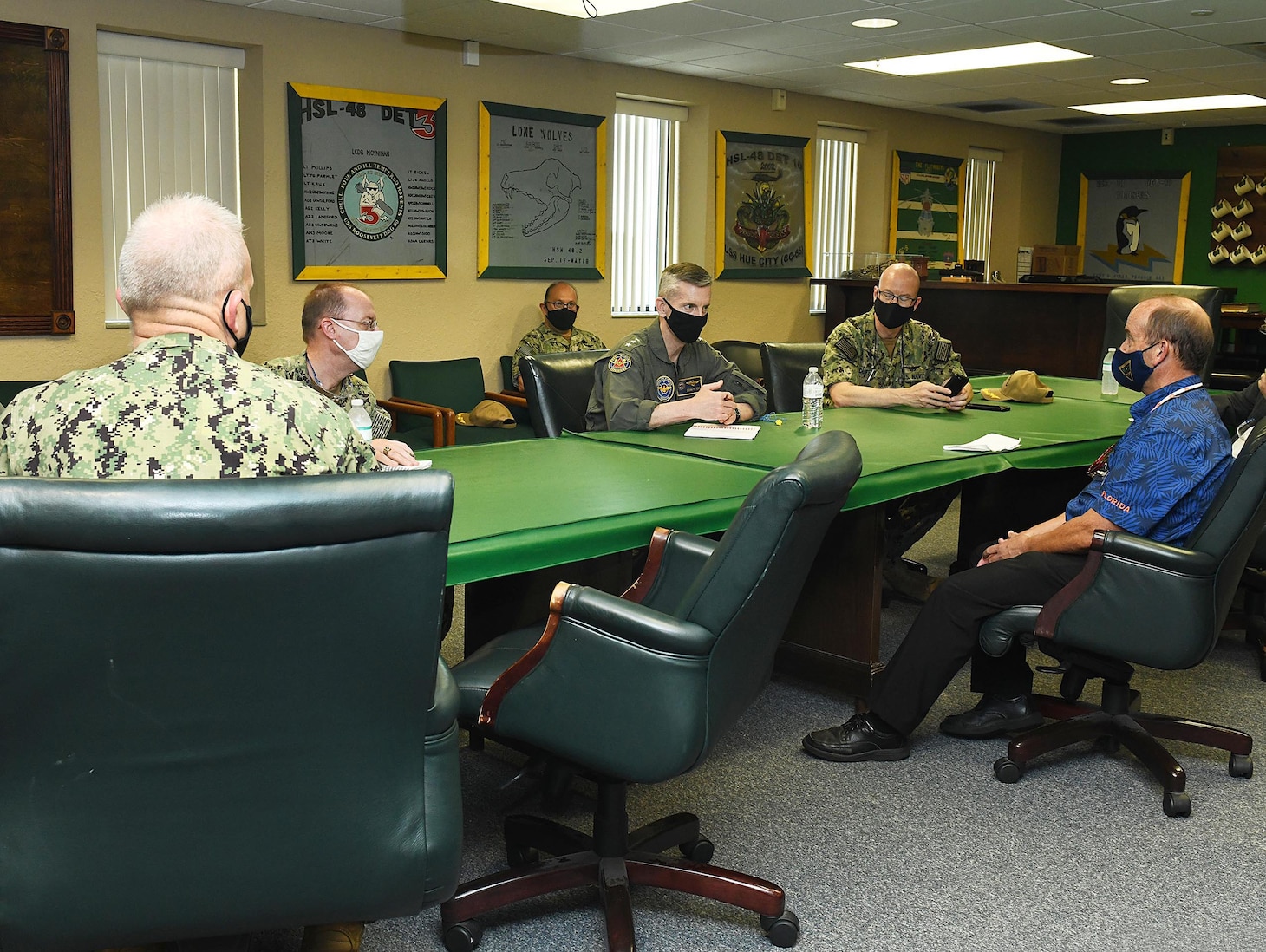 210429-N-DG679-107
MAYPORT, Fla. (April 29, 2021) Vice Adm. Dean Peters, commander, Naval Air Systems Command, fist bumps Combined Trades Leader Tomias Moore after presenting him a coin during his closing remarks following a tour of Fleet Readiness Center Southeast’s (FRCSE) Vertical Lift Production Line at Naval Station Mayport. Vice Adm. Dean Peters visited FRCSE as part of a Micro Boots on the Ground event, Apr. 29, 2021. (U.S. Navy Photo by Toiete Jackson/Released)