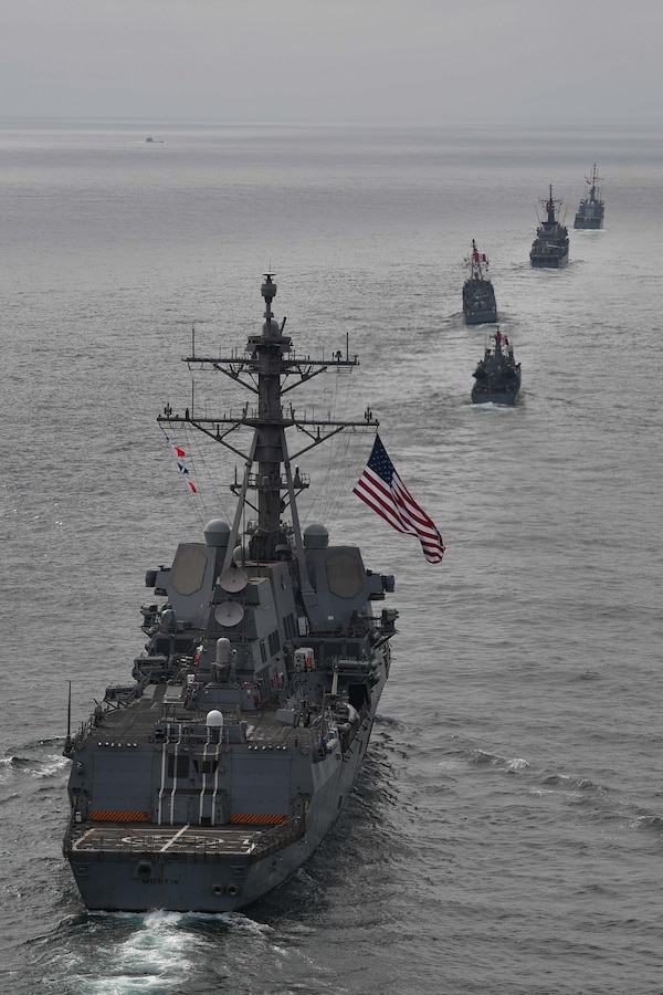 USS Mustin (DDG 89) follows multinational force ships while conducting tactical maneuvers and naval formations during a training exercise as part of UNITAS LXII.