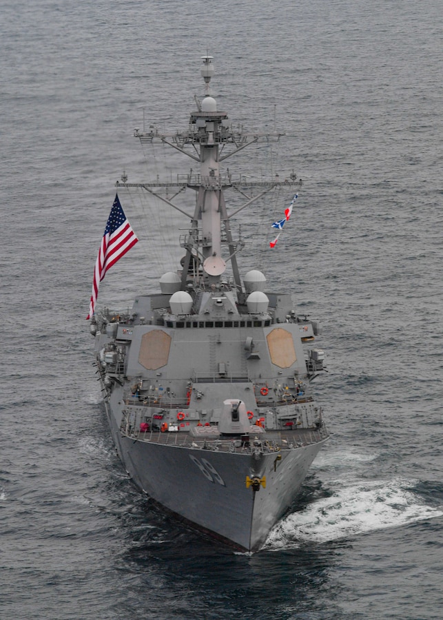 The Arleigh Burke-class guided-missile destroyer USS Mustin (DDG 89) conducts tactical maneuvers and naval formations during a training exercise as part of UNITAS LXII.