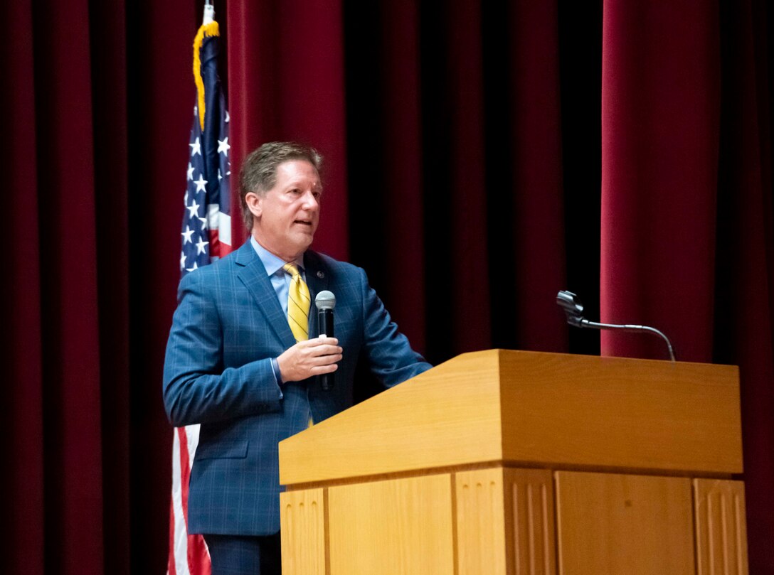 Chris Locke, 436th Airlift Wing honorary commander, speaks during a mental health seminar at Dover Air Force Base, Delaware, Sept. 28, 2021. Locke and his family formed the SL24 UnLocke the Light Foundation to educate and assist those dealing with depression and suicidal thoughts after losing his son, Sean, to suicide in 2018. (U.S. Air Force photo by Senior Airman Stephani Barge)