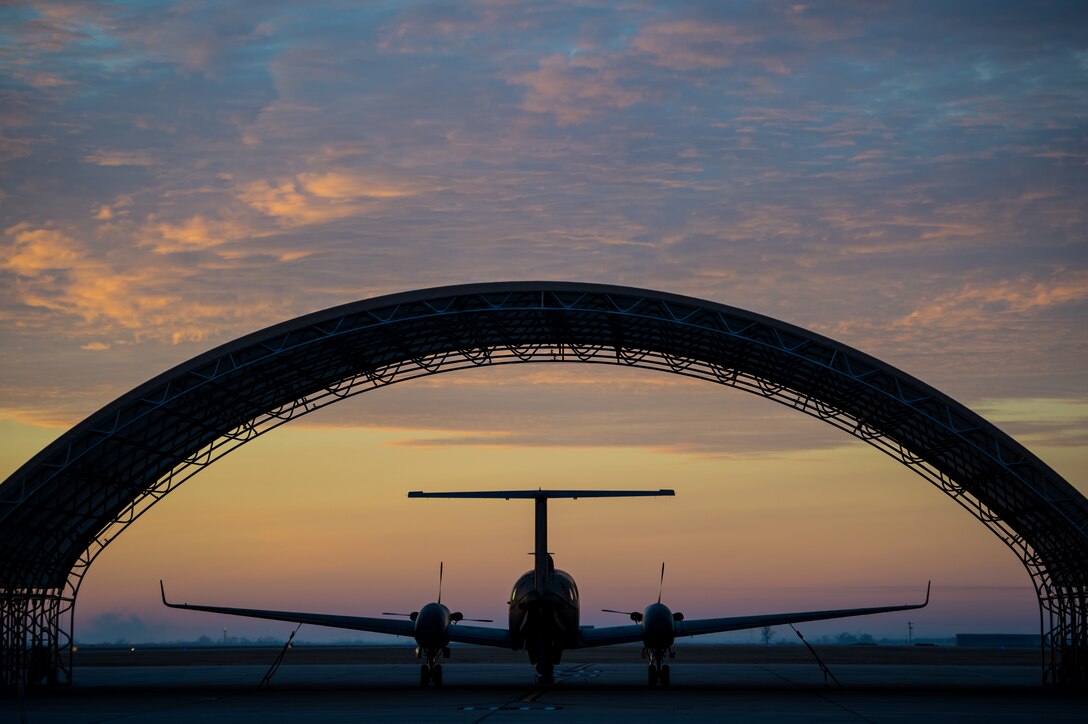 A U.S. Air Force MC-12W awaits a preflight inspection