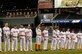 The Joint Base Anacostia-Bolling softball team is introduced to the crowd at Nationals Park before competing in The Battle of the Bases Championship Softball Game in Washington, D.C., Sept. 18, 2021. Teams from Joint Base Anacostia-Bolling and Joint Base Myer-Henderson Hall earned their shot at the title after eliminating 20 teams from National Capital Region military installations. The Washington Nationals sponsored and hosted the tournament at JBAB and the championship game and Nationals Park. National Capital Region military installations look to identify and develop outreach opportunities that strengthen military and local community relationships. (U.S. Air Force photo by Tech. Sgt. Corey Hook)