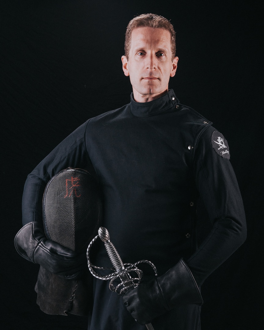 Lt. Col. Robert G. Childs, 234th Intelligence Squadron commander, poses for a competitor portrait Feb. 18, 2018, at Huntington Beach, California. Childs competes as a martial arts sword fighter throughout the world, and became a world champion in the open rapier and dagger category at Swordfish XIV, Gothenburg, Sweden.