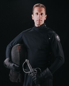 Lt. Col. Robert G. Childs, 234th Intelligence Squadron commander, poses for a competitor portrait Feb. 18, 2018, at Huntington Beach, California. Childs competes as a martial arts sword fighter throughout the world, and became a world champion in the open rapier and dagger category at Swordfish XIV, Gothenburg, Sweden.