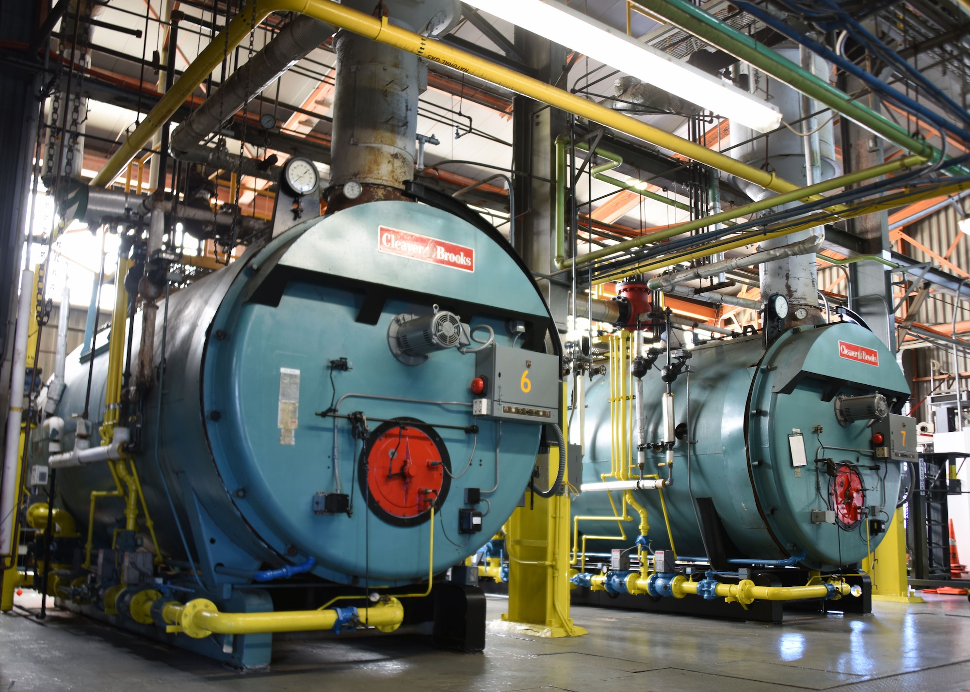 A picture of two high-pressure boilers inside the power plant.