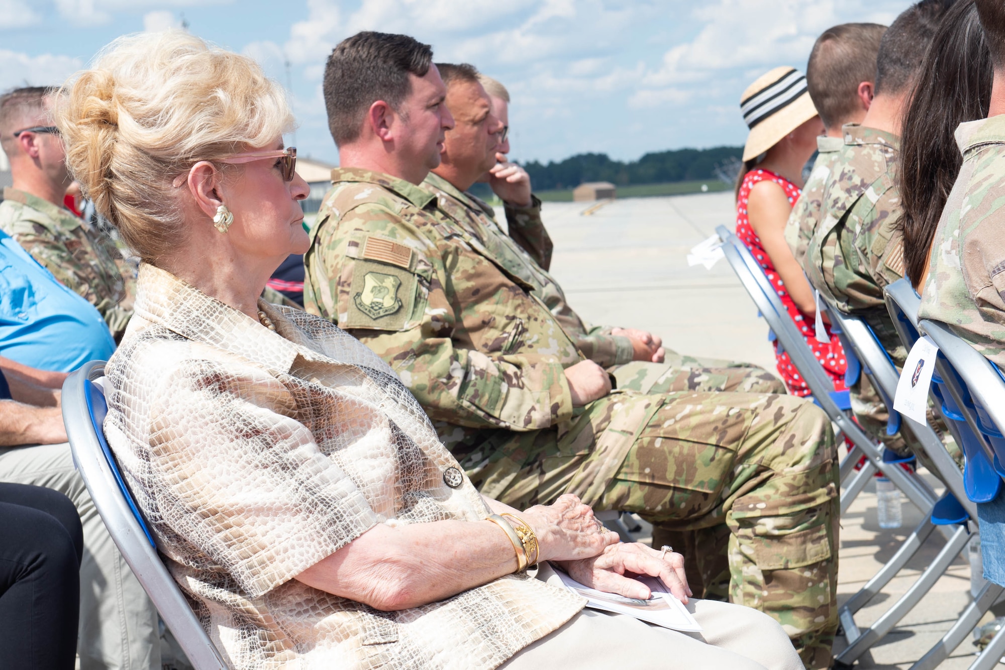 A photo of a woman sitting.