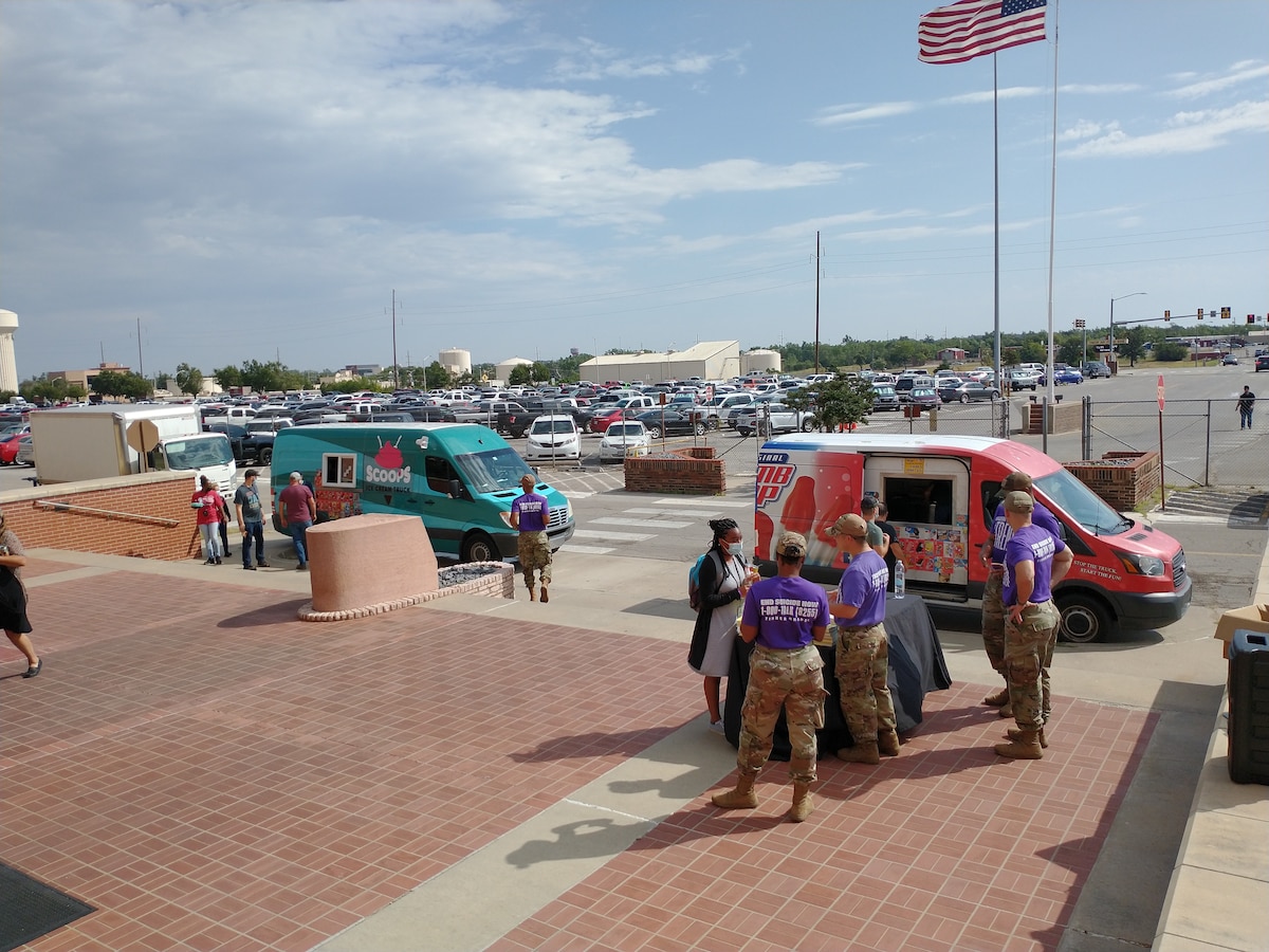 Tinker Air Force Base Chaplains and staff take time to talk with Air Force Sustainment Center staff as they stop by the ice cream truck vendors. The chapel team sponsored the ice cream social as a way to celebrate life during National Suicide Prevention Awareness Month.