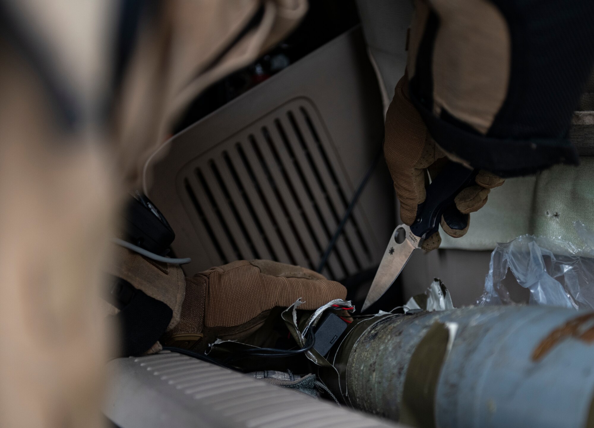 Staff Sgt. Mark White, 8th Civil Engineer Squadron explosive ordnance disposal technician, disables a training explosive device during a simulated training exercise at Kunsan Air Base, Republic of Korea, Sept. 28, 2021. EOD technicians are trained to detect, disarm and dispose of explosive threats in the most extreme environments and are assigned to dangerous missions in diverse environments worldwide. (U.S. Air Force photo by Senior Airman Suzie Plotnikov)