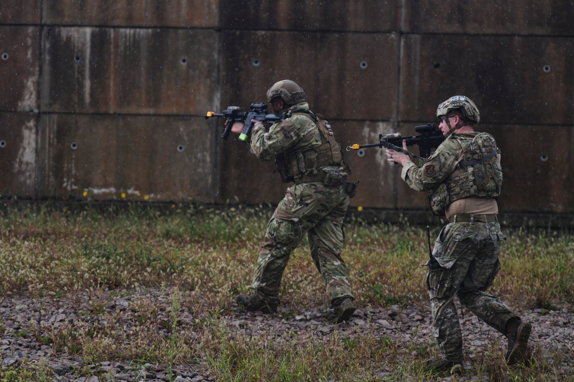 Airmen search a perimeter during training.