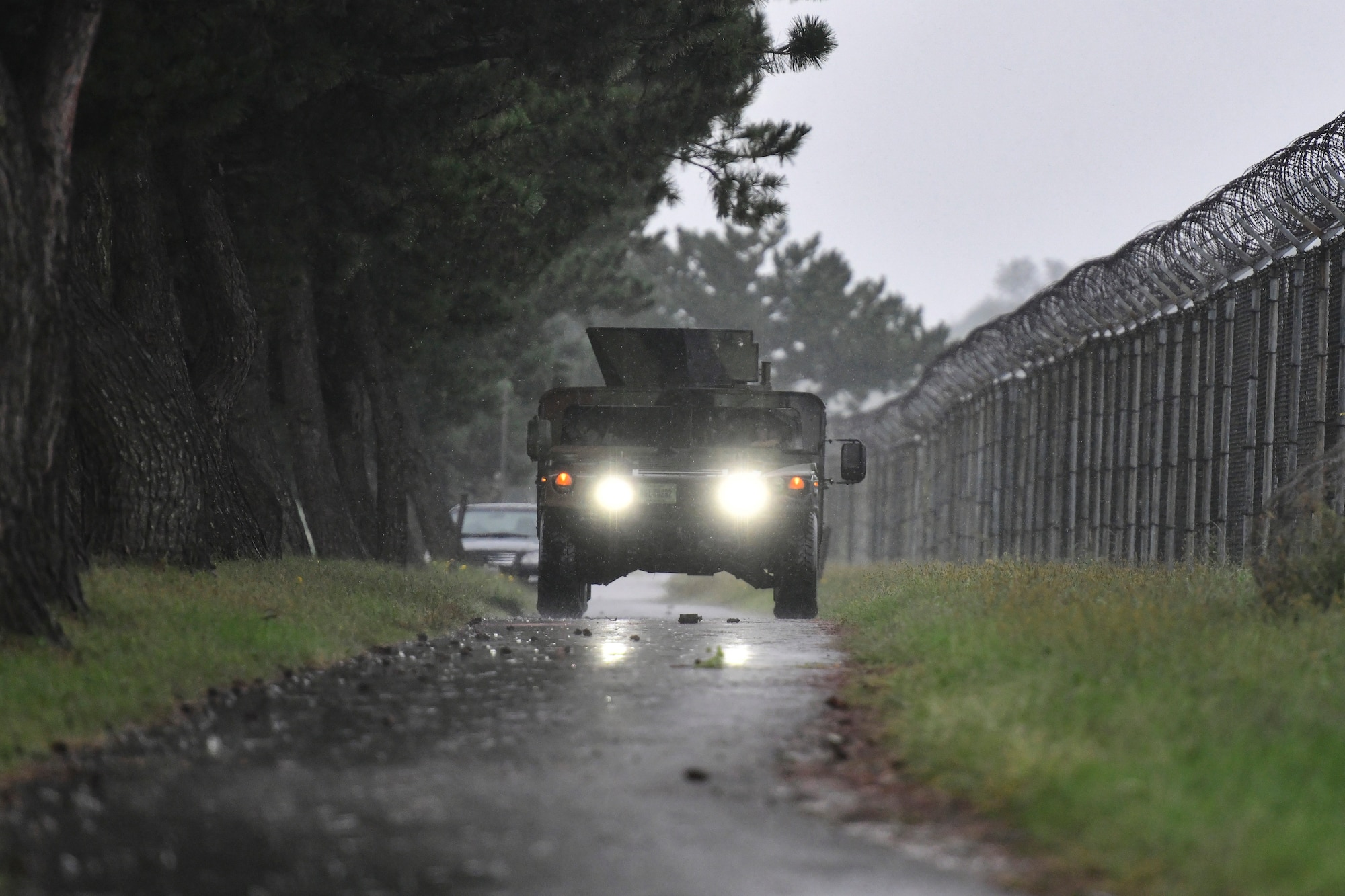 A Humvee arrives to a scene.