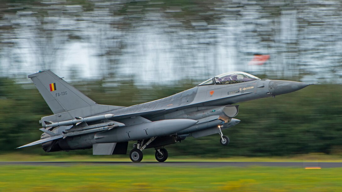 A Belgium Air Force F-16 Fighting Falcon lands during the Suppression of Enemy Air Defense phase of a weapons instructor course at Leeuwarden Air Base, Netherlands, Sept. 13, 2021. The SEAD phase included aircraft from Belgium, the Netherlands, Norway and the United States. (U.S. Air Force photo by Tech. Sgt. Anthony Plyler)