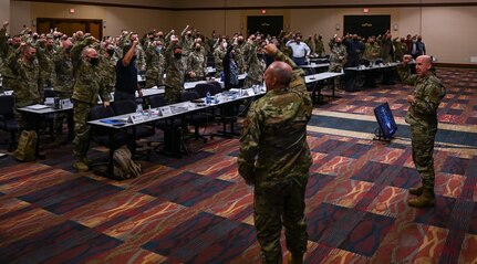 Air Force Recruiters express enthusiasm during their Senior Leader Summit in August.