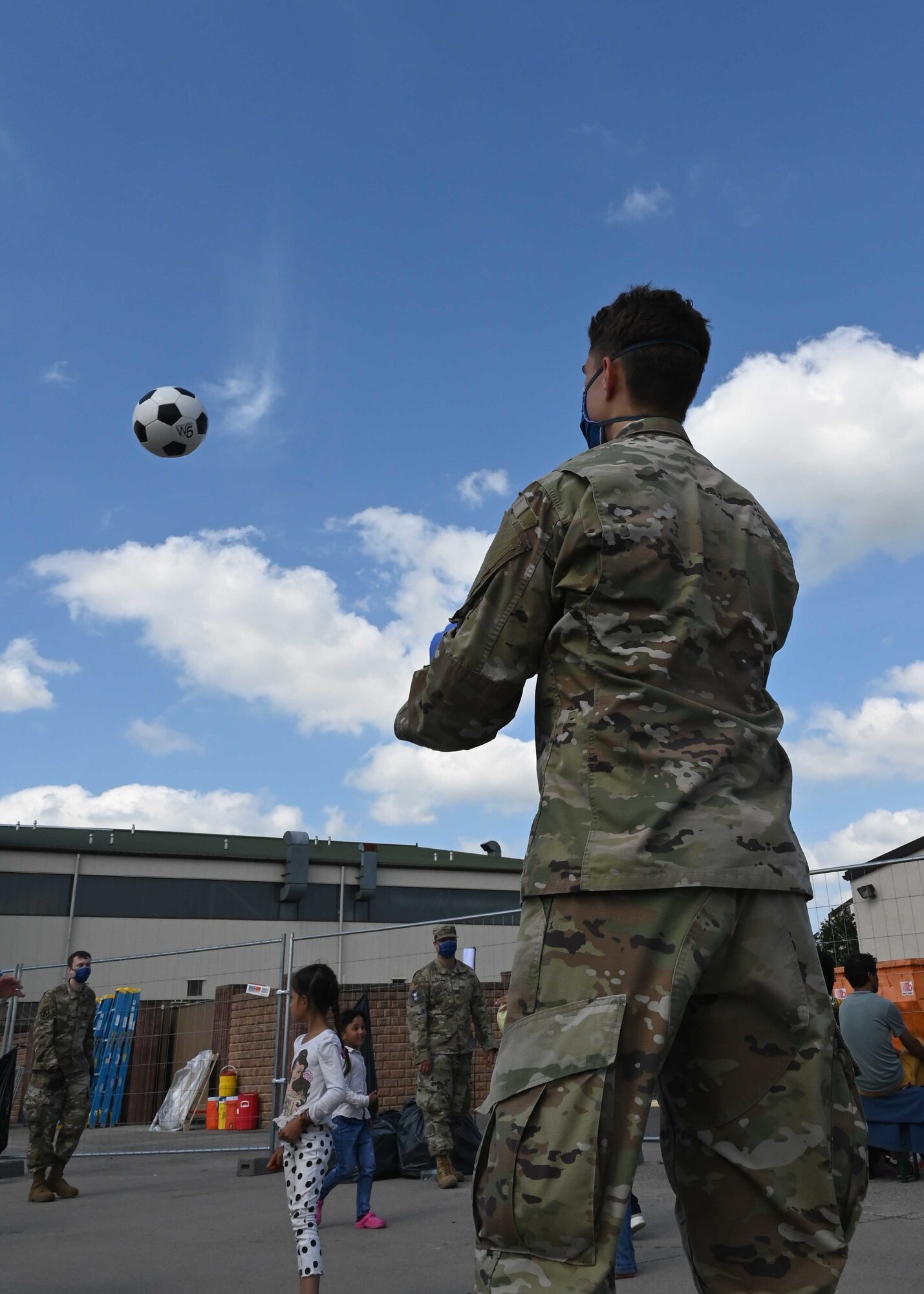 Man plays with soccer ball