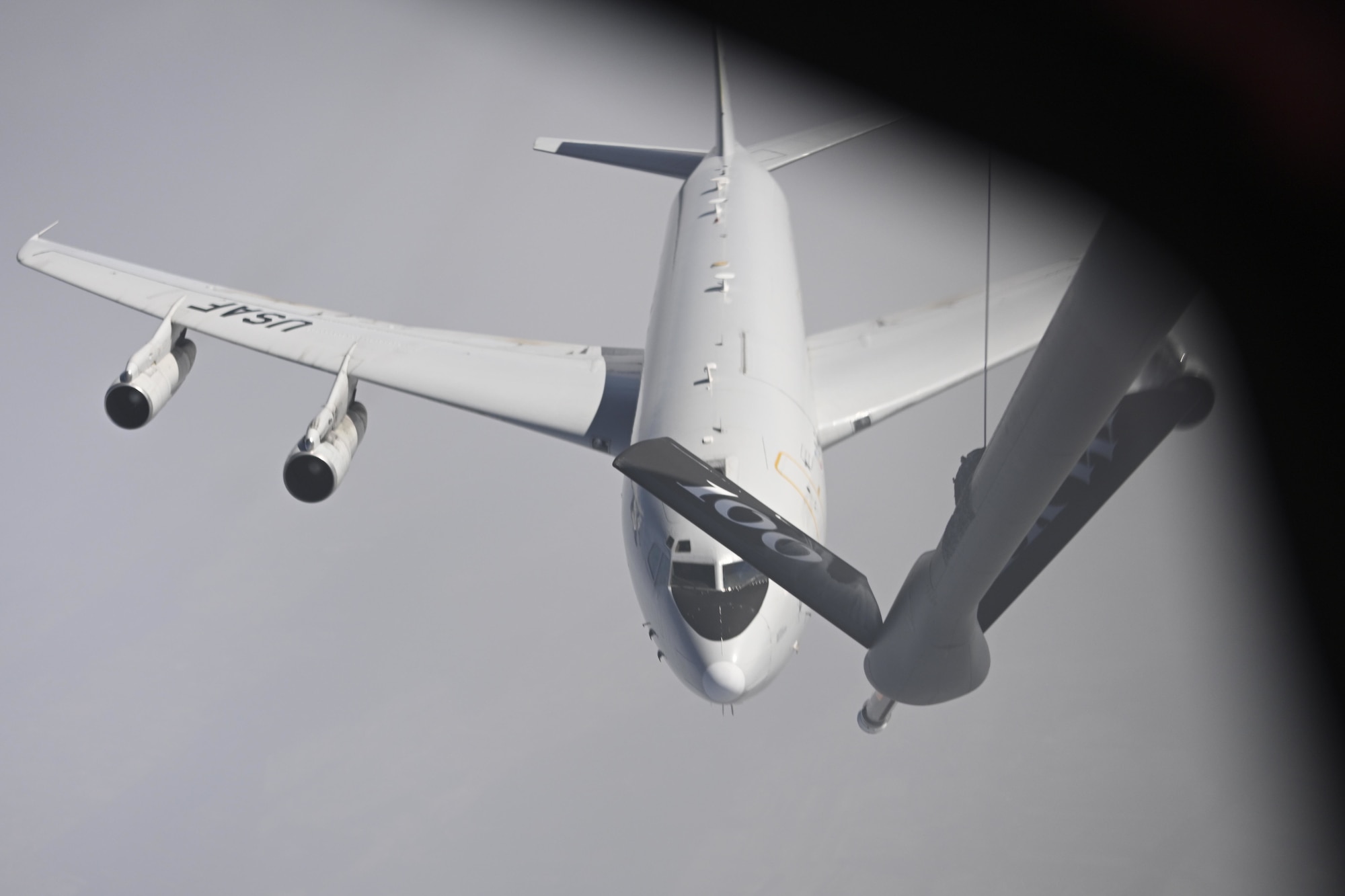 A U.S. Air Force E-8C Joint STARS aircraft approaches a KC-135 Stratotanker aircraft assigned to the 100th Air Refueling Wing, Royal Air Force Mildenhall, England, to receive fuel over Poland, March 30, 2022. The 100th ARW is the only permanent U.S. air refueling wing in Europe and Africa. (U.S. Air Force photo by Senior Airman Joseph Barron)