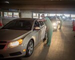 BAMC medics screen patients at the BAMC COVID-19 drive-through testing site.